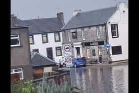 A photograph taken by a local resident in Kincardine shows the High Street completely submerged in water. (Credit: Fife Jammer Locations)
