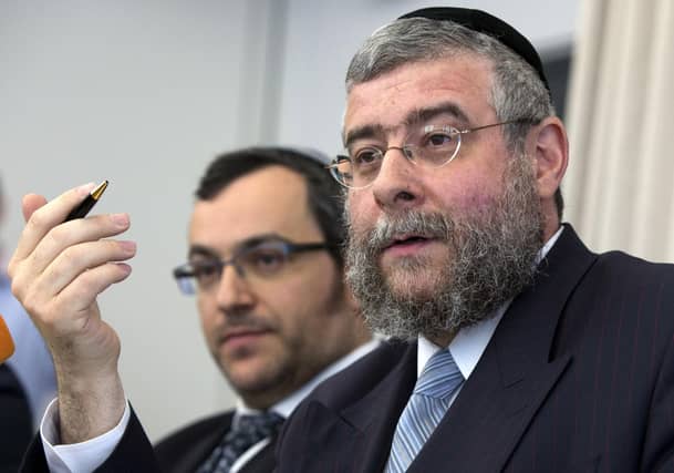 Moscow’s chief rabbi, Pinchas Goldschmidt, right, left Russia in July after the authorities put pressure on him to support the war in Ukraine. He did not (Picture: David Gannon/AFP/Getty Images)