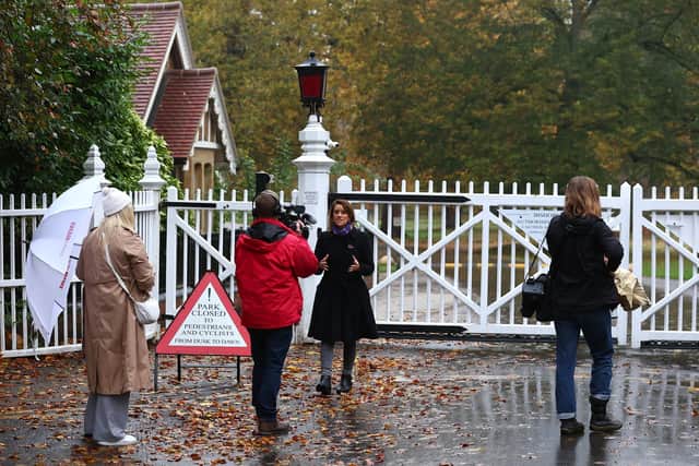 Members of the media gather outside the gates to Royal Lodge following the announcement that Andrew Mountbatten Windsor will have to surrender the lease on the property. Picture: Peter Nicholls/Getty Images