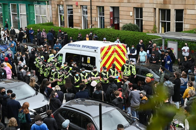 Kenmure Street: Glasgow residents and activists protest chanting ' deportations no more' in standoff with Home Office's UK Border Agency allegedly attempting to deport neighbours | The Scotsman