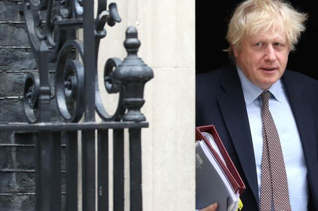 Prime Minister Boris Johnson leaves 10 Downing Street for PMQs in the House of Commons