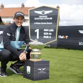 Grant Forrest pictured with the Genesis Scottish Open Trophy at a media day at The Renaissance for the Rolex Series event on 13-16 July. Picture: SNS