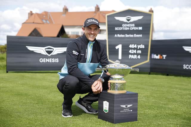 Grant Forrest pictured with the Genesis Scottish Open Trophy at a media day at The Renaissance for the Rolex Series event on 13-16 July. Picture: SNS