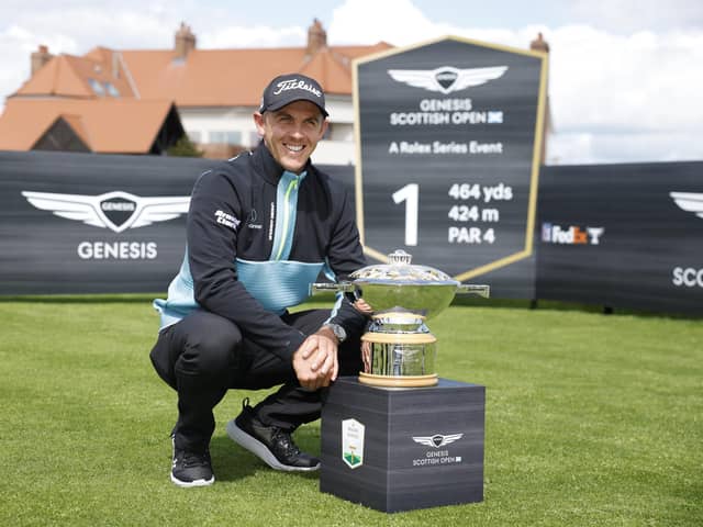 Grant Forrest pictured with the Genesis Scottish Open Trophy at a media day at The Renaissance for the Rolex Series event on 13-16 July. Picture: SNS