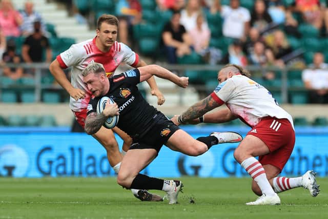 Stuart Hogg, playing for Exeter Chiefs, tries to escape the clutches of Harlequins' Joe Marler during the Gallagher Premiership final at Twickenham. The Scotland captain sought out Marler afterwards to speak about mental health. (Photo by David Rogers/Getty Images)