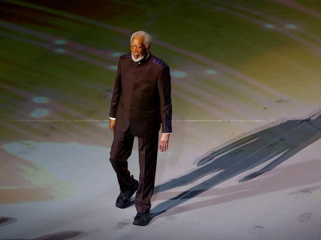 Morgan Freeman performs during the opening ceremony.