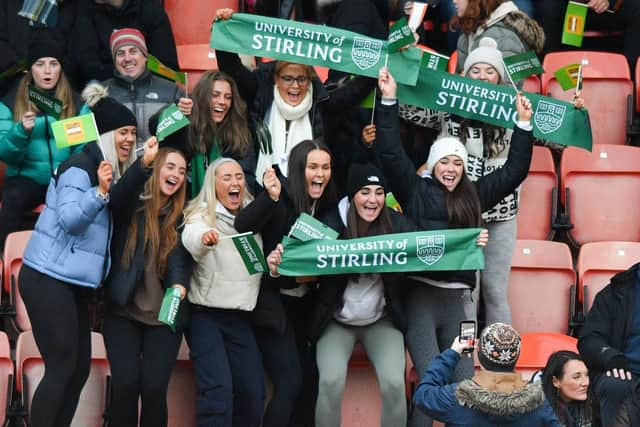 University of Stirling fans cheer their team on at Tannadice.