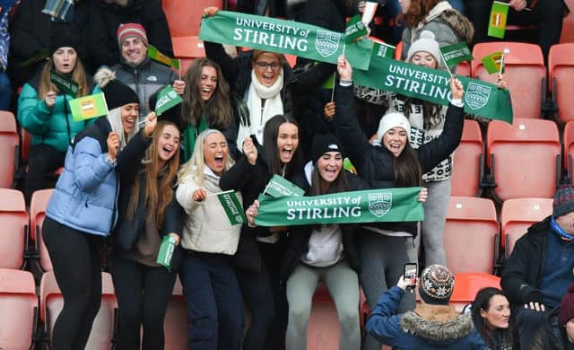 University of Stirling fans cheer their team on at Tannadice.