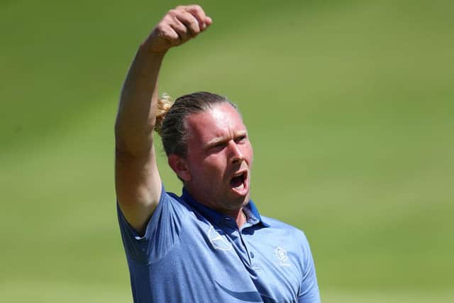 Marcel Siem celebrates his putt on the 18th hole after finishing the second round with a birdie in the 149th Open at Royal St George’s. Picture: Christopher Lee/Getty Images.