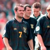 Dejection for John Spencer, Stuart McCall, and Stewart McKimmie after defeat at Wembley in Euro 96