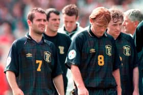 Dejection for John Spencer, Stuart McCall, and Stewart McKimmie after defeat at Wembley in Euro 96