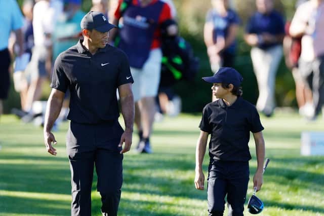 Tiger Woods and son Charlie during the pro-am ahead of the PNC Championship at the Ritz Carlton Golf Club in Orlando, Florida. Picture: Douglas P. DeFelice/Getty Images.