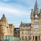 The grand front entrance of the new Edinburgh Futures Institute, the result of a major 'recycling' project which has transformed the historical Royal Infirmary of Edinburgh building into a state-of-the-art innovation hub and public space