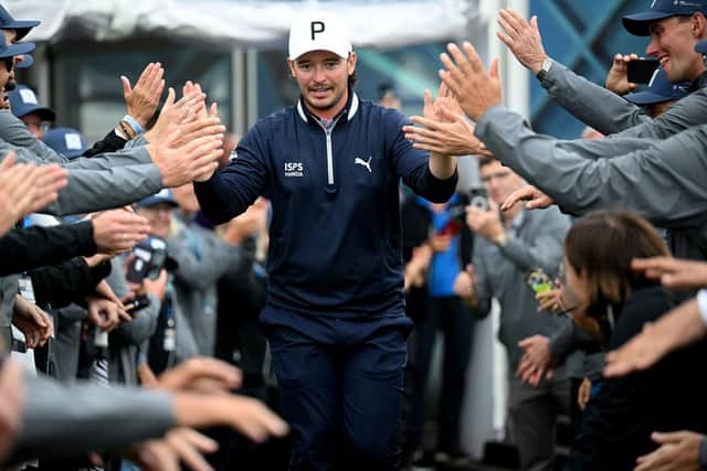 Ewen Ferguson with the volunteers after winning the BMW International Open at Golfclub Munchen Eichenried on Sunday. Picture: Stuart Franklin/Getty Images.