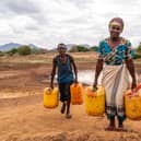 Justine lives with her husband and five children near the Kalikuvu earth dam in Kitui, south Kenya, where communities vulnerable to the impact of climate change are struggling with prolonged periods of drought and erratic heavy rainfall. Picture by Adam Finch