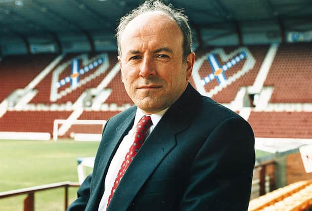 Former Hearts chairman Leslie Deans, pictured at Tynecastle in 1997, has died at the age of 71.