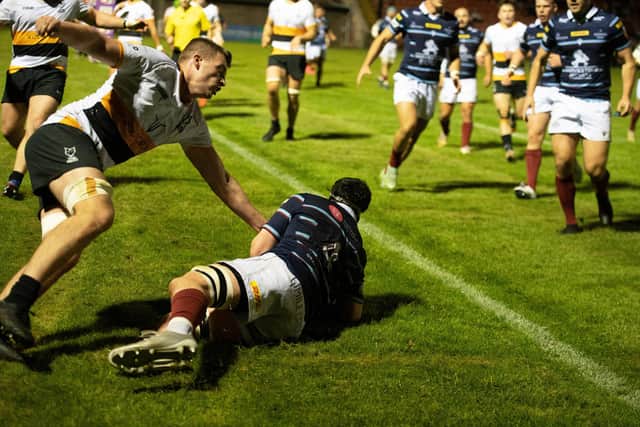 Kwagga van Niekerk scores a first half try for Watsonians during a FOSROC Super Six match against Stirling Wolves last season. (Photo by Paul Devlin / SNS Group)