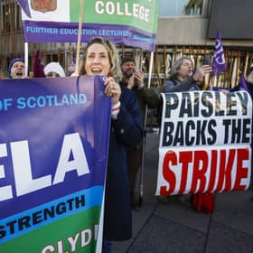 Further education lecturers hold a rally outside the Scottish Parliament amid an ongoing dispute that's become a rear-guard action in defence of the college sector (Picture: Jeff J Mitchell/Getty Images)