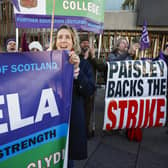Further education lecturers hold a rally outside the Scottish Parliament amid an ongoing dispute that's become a rear-guard action in defence of the college sector (Picture: Jeff J Mitchell/Getty Images)