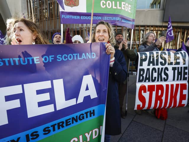 Further education lecturers hold a rally outside the Scottish Parliament amid an ongoing dispute that's become a rear-guard action in defence of the college sector (Picture: Jeff J Mitchell/Getty Images)