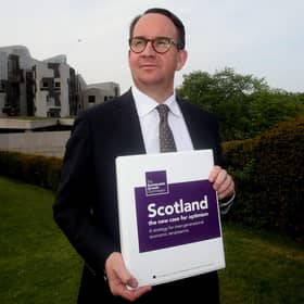 The response to the Gers figures by pro-independence economist Andrew Wilson, seen with SNP's Sustainable Growth Commission report, did not impress Murdo Fraser (Picture: Gordon Terris/The Herald/PA Wire)