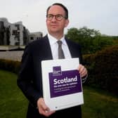 The response to the Gers figures by pro-independence economist Andrew Wilson, seen with SNP's Sustainable Growth Commission report, did not impress Murdo Fraser (Picture: Gordon Terris/The Herald/PA Wire)
