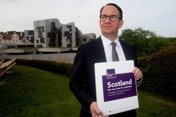 The response to the Gers figures by pro-independence economist Andrew Wilson, seen with SNP's Sustainable Growth Commission report, did not impress Murdo Fraser (Picture: Gordon Terris/The Herald/PA Wire)