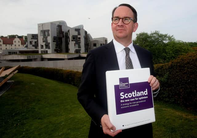 The response to the Gers figures by pro-independence economist Andrew Wilson, seen with SNP's Sustainable Growth Commission report, did not impress Murdo Fraser (Picture: Gordon Terris/The Herald/PA Wire)