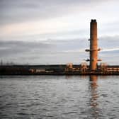 Longannet Power Station. The 600ft chimney at the site of Scotland's last remaining coal fired power station. The iconic chimney at Longannet has dominated the Firth of Forth skyline for over fifty years.