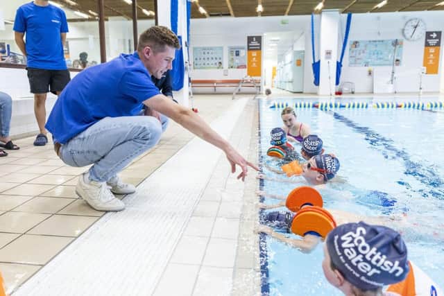 Duncan Scott teaching children at the Royal Commonwealth Pool, Edinburgh