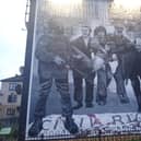Bogside Artists' mural depicting a famous photograph from Bloody Sunday of the dying Jackie Duddy being carried by local men as a local priest Fr Edward Daly (later Bishop) tries to lead them to safety waving a blood stained white handkerchief. The mural is one of several which make up the People's Gallery in the Bogside, where the killings happened. Picture: JPIMedia