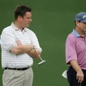 Stuart Wilson waits with Tom Watson on the first green during the second round  of the 2005 Masters at Augusta National Golf Club. Picture: Andrew Redington/Getty Images.
