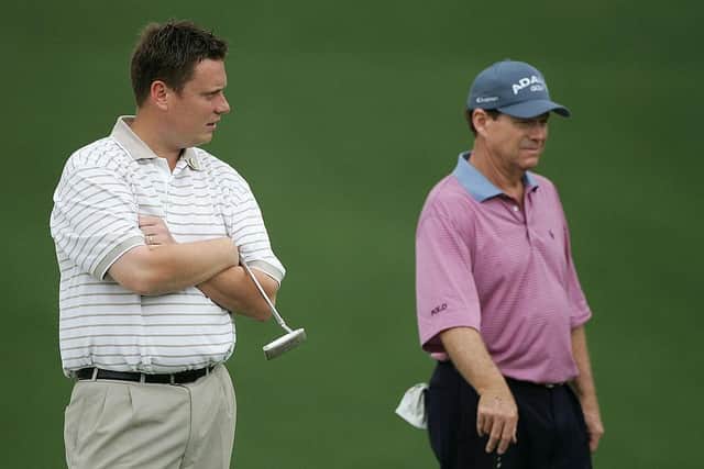 Stuart Wilson waits with Tom Watson on the first green during the second round of the 2005 Masters at Augusta National Golf Club. Picture: Andrew Redington/Getty Images.
