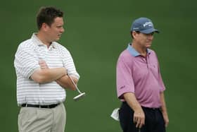 Stuart Wilson waits with Tom Watson on the first green during the second round  of the 2005 Masters at Augusta National Golf Club. Picture: Andrew Redington/Getty Images.