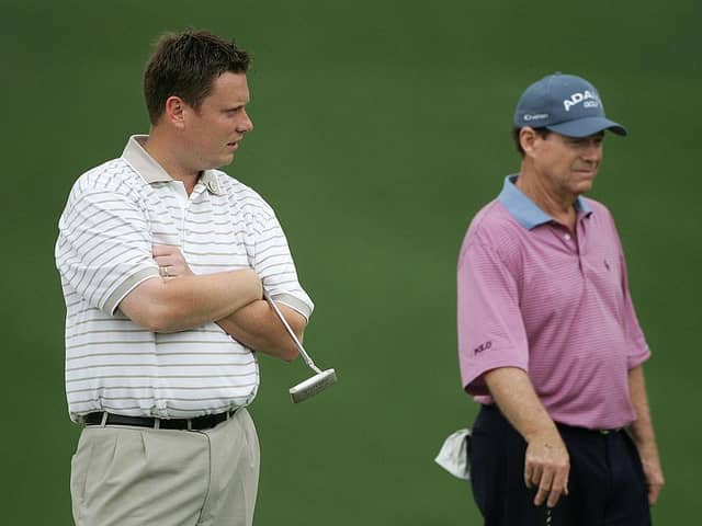 Stuart Wilson waits with Tom Watson on the first green during the second round  of the 2005 Masters at Augusta National Golf Club. Picture: Andrew Redington/Getty Images.