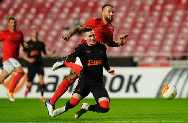 Benfica's Nicolas Otemendi fouls Ryan Kent and is subsequently red carded during  the UEFA Europa League match between Benfica and Rangers (Photo by Gualter Fatia / SNS Group)