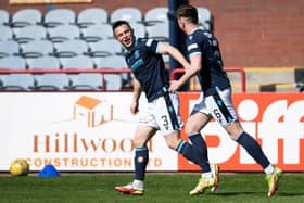 Jordan Marshall (L) was all smiles in the first half but a 1-1 draw was 'bitter-sweet' for Dundee. (Photo by Paul Devlin / SNS Group)