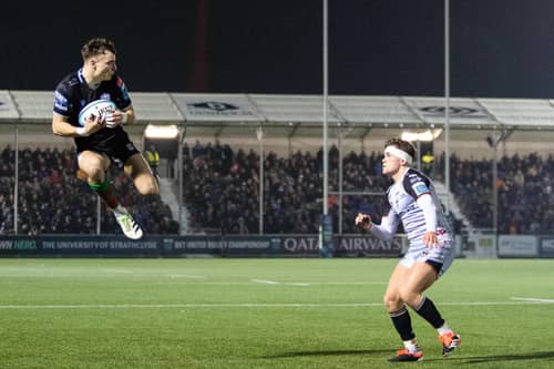 An airborne Jamie Dobie in action for Glasgow Warriors during the recent win over the Dragons at Scotstoun in the BKT United Rugby Championship. (Photo by Calum Chittleburgh / SNS Group)