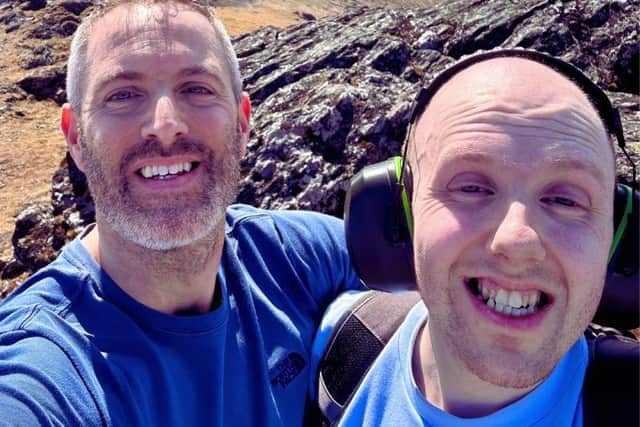 Support Worker Guy, and Sean on their recent hiking challenge.