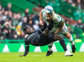 Hibs' Elie Youan was sent off for a second booking following this incident with Celtic's Cameron Carter-Vickers.