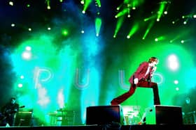 INDIO, CA - APRIL 13:  Singer Jarvis Cocker of Pulp performs onstage during day 1 of the 2012 Coachella Valley Music & Arts Festival at the Empire Polo Field on April 13, 2012 in Indio, California.  (Photo by Kevin Winter/Getty Images for Coachella)