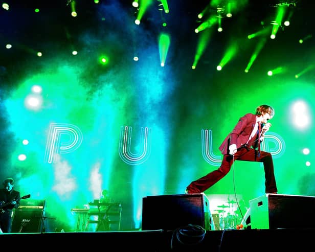 INDIO, CA - APRIL 13:  Singer Jarvis Cocker of Pulp performs onstage during day 1 of the 2012 Coachella Valley Music & Arts Festival at the Empire Polo Field on April 13, 2012 in Indio, California.  (Photo by Kevin Winter/Getty Images for Coachella)