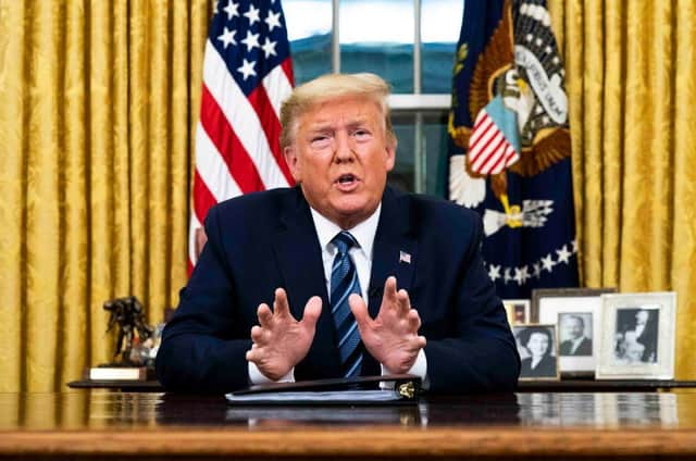 Donald Trump took to the Oval Office to announce the new restrictions. Picture: Doug Mills-Pool/Getty Images