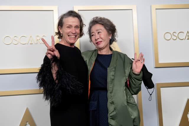 (L-R) Frances McDormand, best actress winner for Nomadland, and Minari star Yuh-Jung Youn pose in the press room during the 93rd Annual Academy Awards at Union Station. Picture: Matt Petit/A.M.P.A.S. via Getty Images