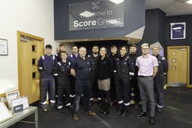 Score Group management team with some of the company's apprentices at its Peterhead HQ