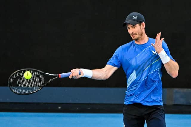 Andy Murray hits a forehand against Daniel Taro on day four of the 2022 Australian Open at Melbourne Park. (Photo by TPN/Getty Images)