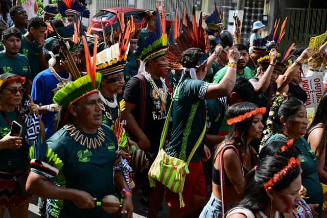 Indigenous people take part in a demonstration during last year's COP30 summit in Brazil (Picture: Pablo Porciuncula/AFP via Getty)