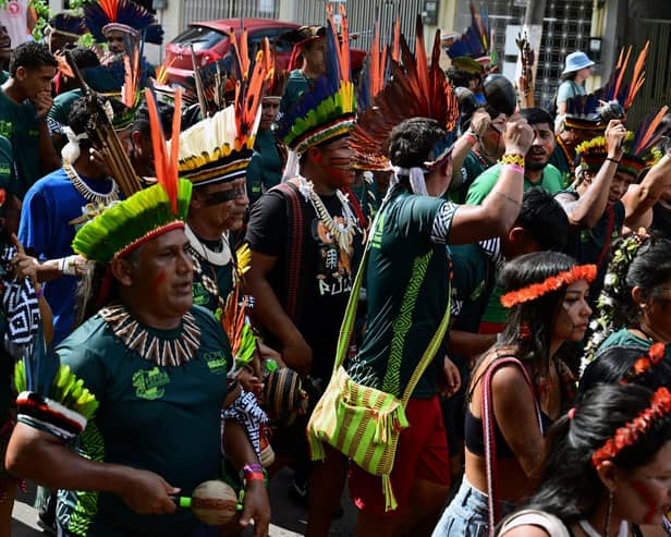 Indigenous people take part in a demonstration during last year's COP30 summit in Brazil (Picture: Pablo Porciuncula/AFP via Getty)
