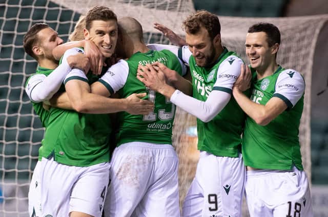 Alex Gogic is swarmed by his Hibs team-mates after scoring to give his side a 2-0 lead against Kimarnock. Photo by Paul Devlin / SNS Group
