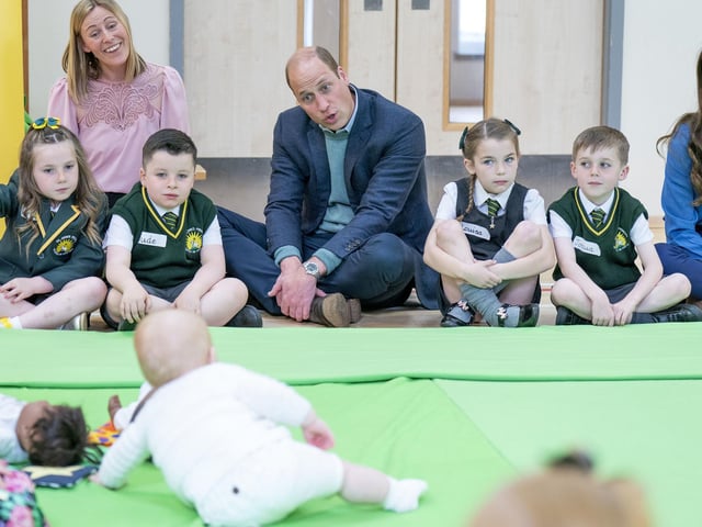 The Duke of Cambridge talks to a youngster at St John's Primary.